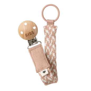 BIBS braided pacifier clip in blush pink and white, with a wooden clip and ring.