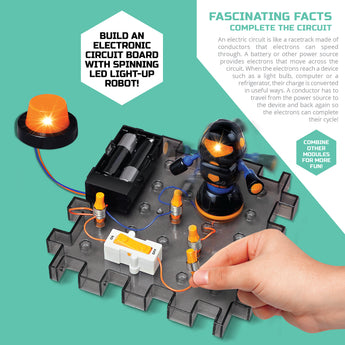 Child's hand building a Discovery Mindblown circuit board with a black and orange LED robot spinner and orange light.