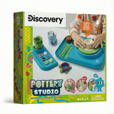 Discovery Kids Pottery Wheel Studio box showing a child using the turquoise motorized wheel, clay, tools, and paints.