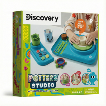 Discovery Kids Pottery Wheel Studio box showing a child using the turquoise motorized wheel, clay, tools, and paints.
