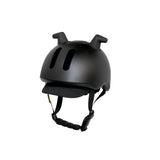 Doona Liki Helmet Black: matte black helmet with unique silicon horns, vents, and adjustable chin strap.