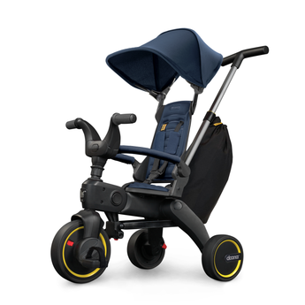 Blue Doona Liki Trike S3 kids tricycle with black frame, yellow accents, and storage bag.