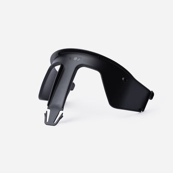 Black KAOS Klapp Kids Safety High Chair Rail, compact plastic design.