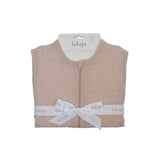 Lulujo 1.0 TOG light pink 100% cotton muslin sleep sack, folded with white logo ribbon.