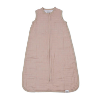 Lulujo light pink 100% cotton muslin sleep sack with a front zipper and sleeveless design.