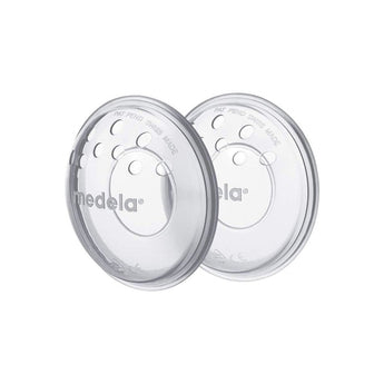Two clear Medela Nipple Formers with soft silicone membranes and ventilation holes.