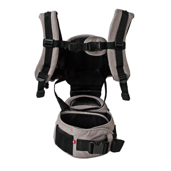 MiaMily Hipster ergonomic baby carrier in light brown fabric with black straps and hip seat.