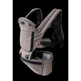 MiaMily Hipster Ergonomic Baby Carrier in beige, showing padded straps, hip seat, and front pocket.