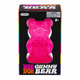 Pink NEE DOH Gummy Bear squishy fidget toy in its colorful retail box.