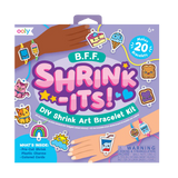 Ooly Shrink Its! DIY Shrink Art Bracelet Kit box with colorful pre-cut charms like ice cream and tacos.