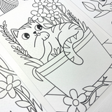Ooly Undercover Art colouring page showing a cute cat in a pot with flowers, revealing hidden patterns.