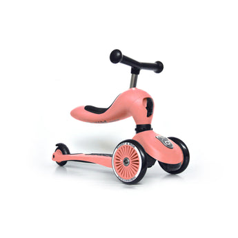 Pink Scoot & Ride Highwaykick 1 2-in-1 kickboard with seat, black handlebars, and three wheels.