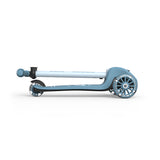 Folded light blue Scoot & Ride Highwaykick 3S LED 3-wheel kids scooter with glowing wheels.