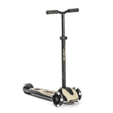 Black Scoot & Ride Highwaykick 5 LED kickboard scooter with cream deck and glowing white wheels.