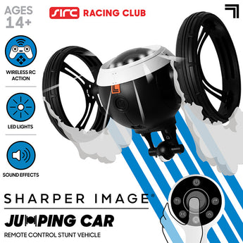 Black Sharper Image RC Jumping Car with large wheels, white accents, and a remote control, against a blue and white background.