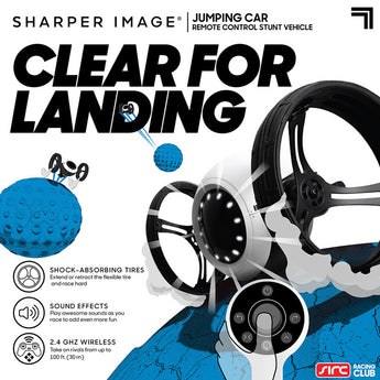 White Sharper Image RC Jumping Car with large black tires and LED lights, shown jumping over blue terrain.