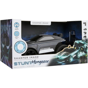 Sharper Image RC Stunt Mongoose LED toy car in box, dark gray with white accents, "Try Me" button visible.