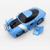 Blue Sharper Image RC Demolition Car with white stripes and a detached side panel, ready for play.
