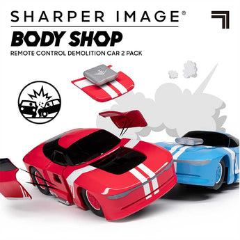 Red and blue Sharper Image RC demolition cars with removable body panels, ready for crashing fun.