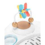 White Skip Hop Discoverosity activity center with colorful pinwheel toy and wooden accents.