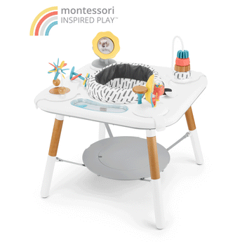 White Skip Hop Discoverosity 3 Stage Activity Center with wooden legs, gray seat, and colorful toys.