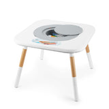 White square activity table with light wood and white legs, featuring a gray lidded storage compartment.