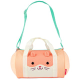 Skip Hop Duffimals kids' peach hamster duffle bag with white handles and a mint green adjustable strap.