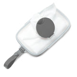 Clear Skip Hop Grab & Go wipes case with a dark gray lid and strap, holding white baby wipes.