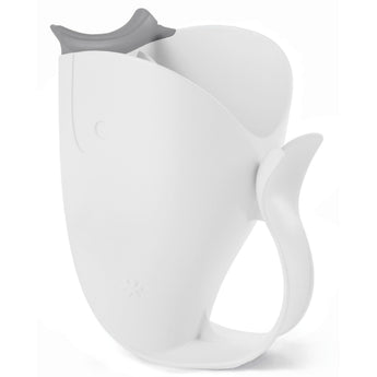 White whale-shaped Skip Hop Moby Waterfall Rinser with a gray rubber lip and easy-grip handle.