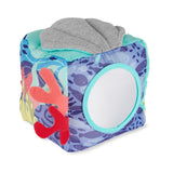 Colorful Skip Hop Seascape soft activity cube with mirror, coral, and shell textures.
