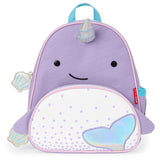 Purple Skip Hop Zoo Narwhal mini backpack for toddlers with a shiny horn, shell zipper pulls, and a holographic tail.
