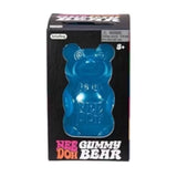 Blue NEE DOH Gummy Bear squishy fidget toy in its black retail box.