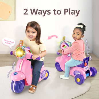 Children riding the pink VTech 2-in-1 Ride & Balance Scooter