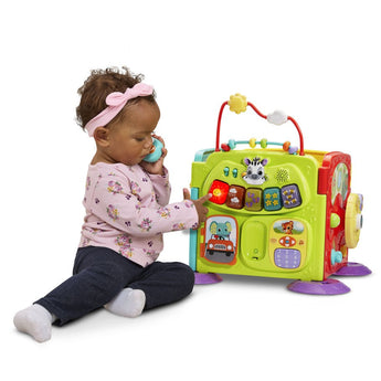 Baby playing with VTech 4-in-1 Steps and Stages Activity Center (80-579400)