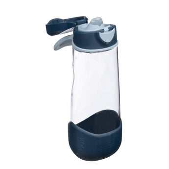 Clear water bottle with a dark blue base and cap on a white background