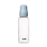 BIBS baby bottle with clear body, light blue cap, and "BIBS" logo.
