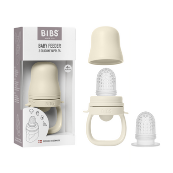 Sage BIBS Baby Feeder with two silicone nipples, shown in and out of its box.