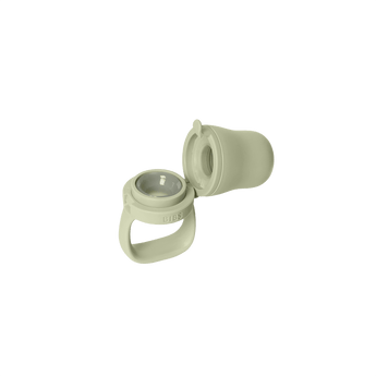 Sage BIBS Baby Feeder with open silicone nipple, showing two parts.