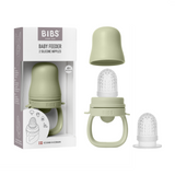 Sage BIBS Baby Feeder with soft silicone nipple, shown in box and disassembled with two nipple sizes.