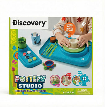 Discovery Kids Pottery Wheel Studio box showing a child using the blue motorized wheel and clay art tools.