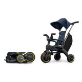 Doona Liki Trike S3 in navy and black, shown folded and fully assembled with a canopy.