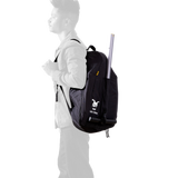 Black Doona Liki Trike Travel Bag backpack on a person's back, durable water-repellent fabric.