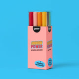 OMY Brush Power acrylic markers shown in open pink packaging with coloured caps