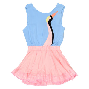 Light blue top and pink skirt with a bird design on a white background