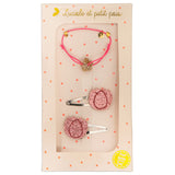 Luciole Et Petit Pois gift set with a pink bracelet and two pink glitter flower hair clips.