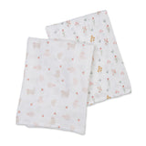 Two Lulujo cotton muslin swaddles: one with pink cats, one with colorful wildflowers.