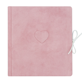 Pink suede baby milestones photo album with an embossed heart and white ribbon tie.
