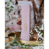 Pink suede personalized baby milestones photo album with gold Cyrillic name, "СОФИЯ", on spine.