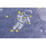 Close-up of a soft, blue My Little Thieves sleeping sack with white and yellow astronaut and star designs.