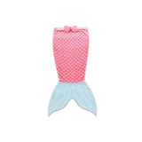 Pink mermaid tail kids sleeping sack with scale pattern and light blue fin, topped with a pink bow.